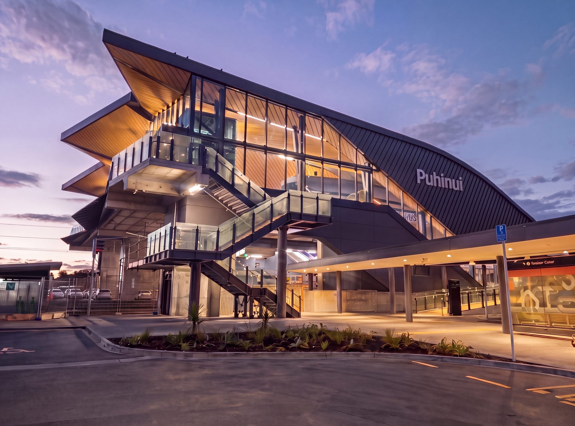 Puhinui Station exterior at dusk